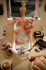 Love Mariel Clayton's work. She does brilliantly unthinkable things to Barbie.